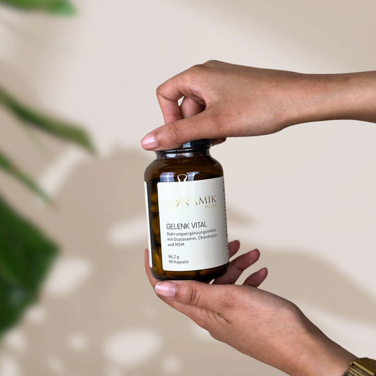 Brauner Glasbehälter mit DynamikPlus "Gelenk Vital" Etikett und schwarzem Drehverschluss