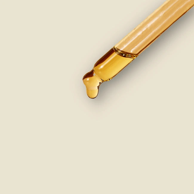 Pipette gefüllt mit Öl