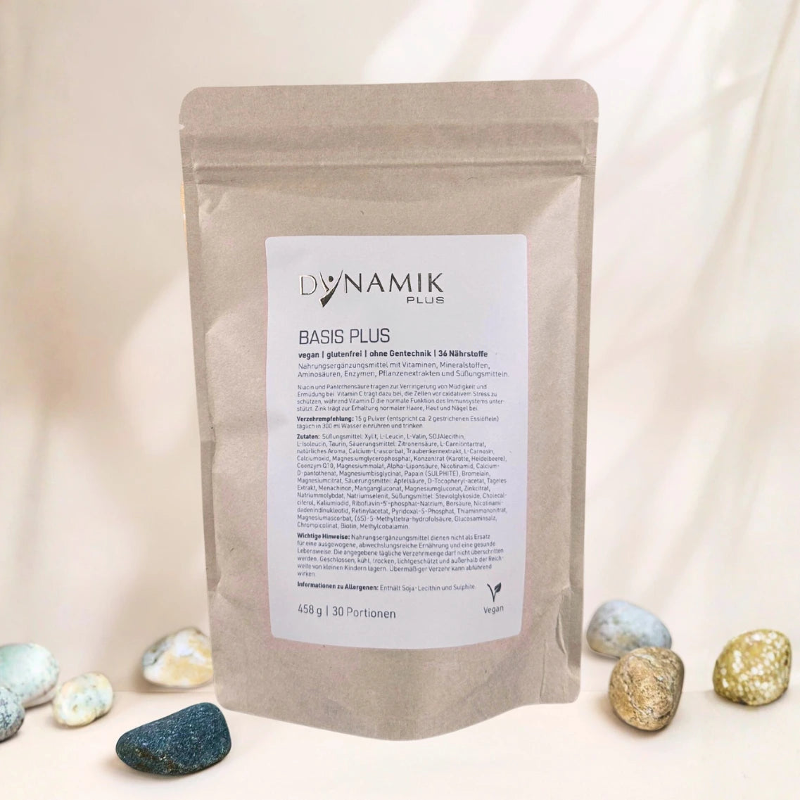 Basis Plus im Kartonbeutel vor beigen Hintergrund 