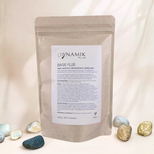 Basis Plus im Kartonbeutel vor beigen Hintergrund 